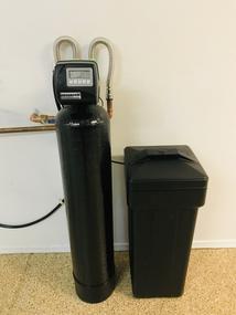 Water softener installed in a garage